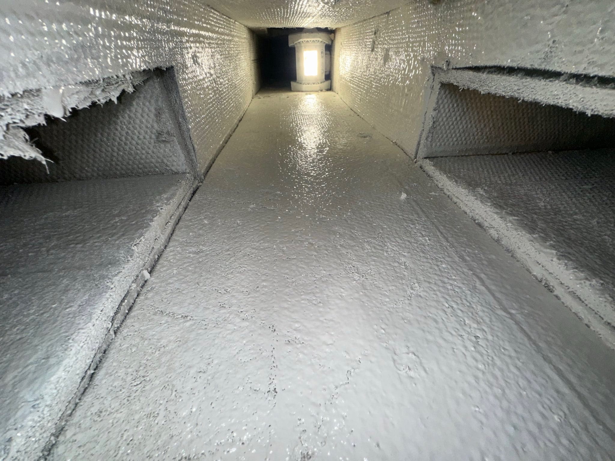Real Duct Cleaning in Florida, before and after image of dirty versus clean air ducts. Real photographs of actual results obtained with air duct cleaning by our company.
